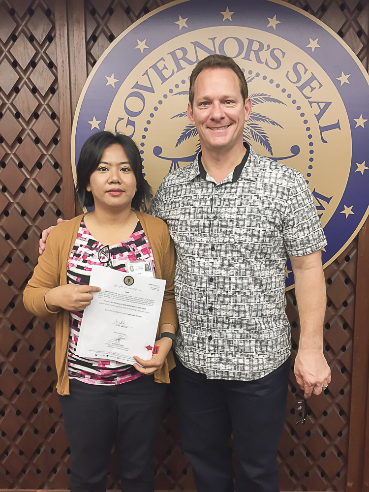 Leah Abelon (left), GSAT Center Coordinator, and Acting Governor of Guam Ray Tenorio (right)